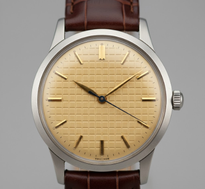 The enduring popularity of the waffle dial texture in mid century watch design aesthetics